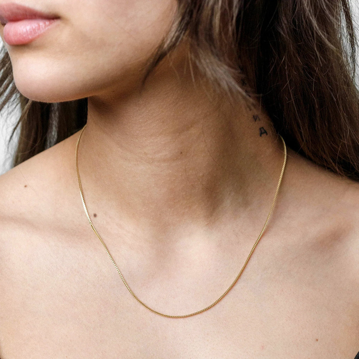 Bingokette 585 Gelbgold massiv - Tragebild am Hals - Echtschmuck